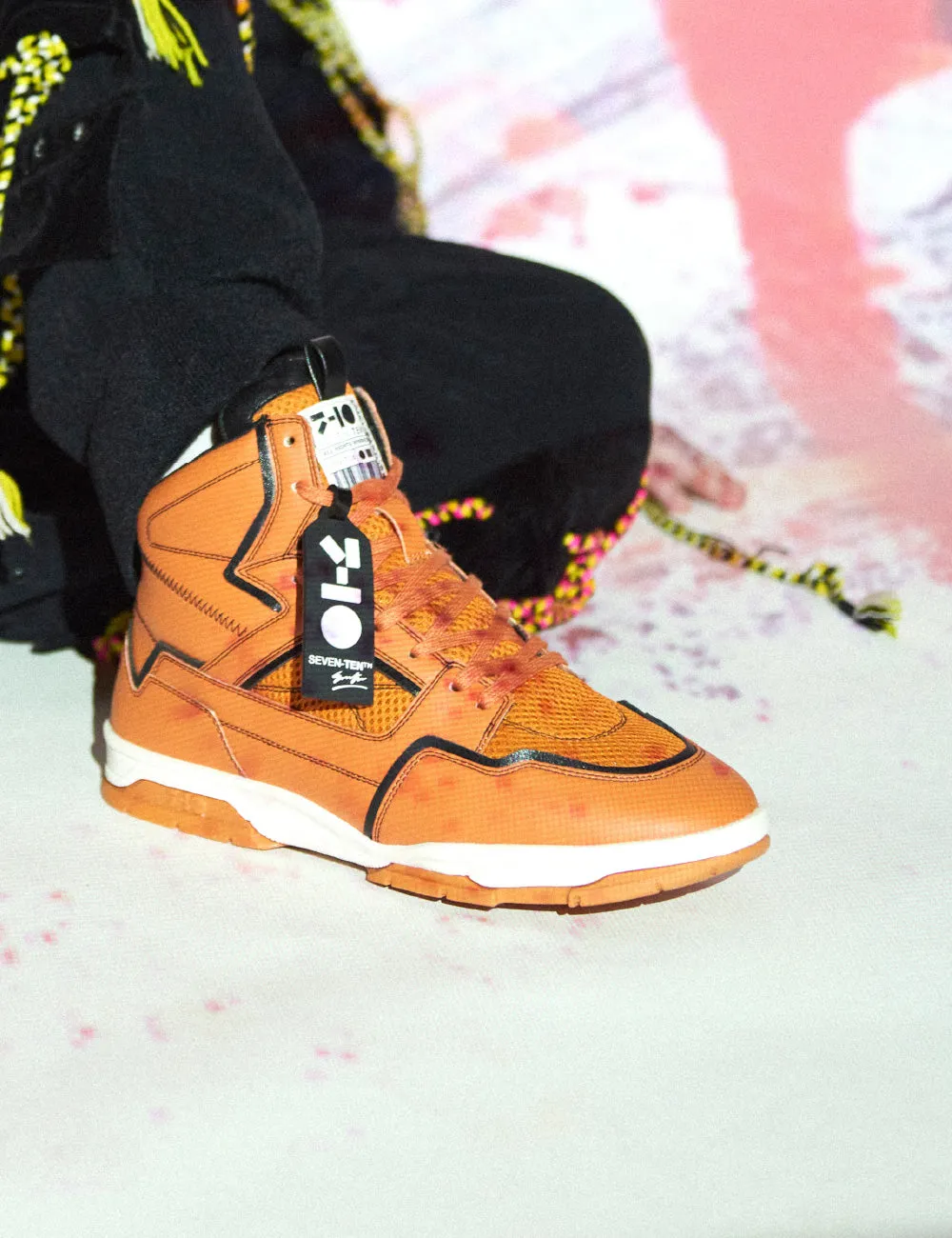 Celeb Spotted - 714 orange black high-top sneaker